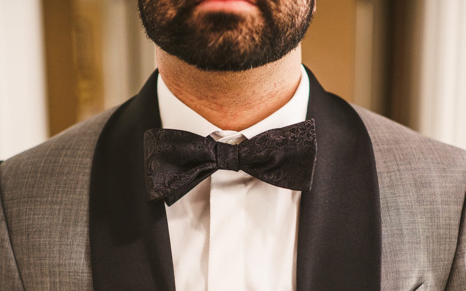 bow tie under collar